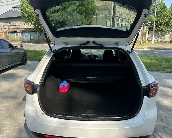 Белый Мазда 6, объемом двигателя 2 л и пробегом 252 тыс. км за 6900 $, фото 1 на Automoto.ua