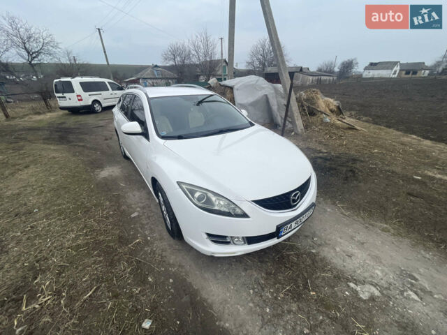 Білий Мазда 6, об'ємом двигуна 2 л та пробігом 335 тис. км за 5500 $, фото 9 на Automoto.ua