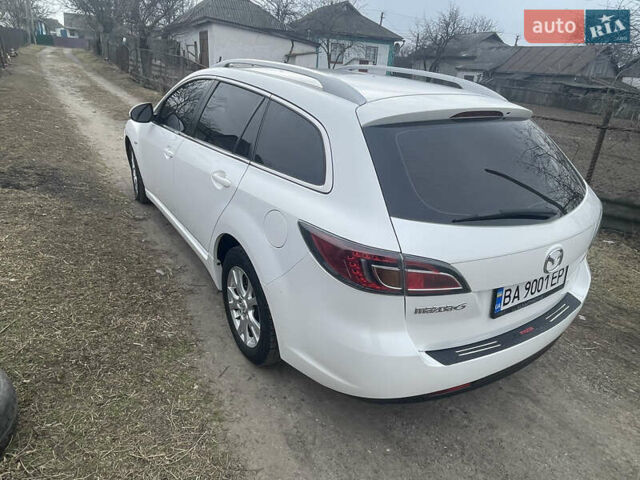 Белый Мазда 6, объемом двигателя 2 л и пробегом 335 тыс. км за 5000 $, фото 1 на Automoto.ua