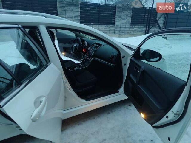 Белый Мазда 6, объемом двигателя 2 л и пробегом 210 тыс. км за 8500 $, фото 21 на Automoto.ua
