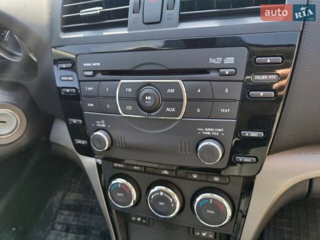 Белый Мазда 6, объемом двигателя 2 л и пробегом 210 тыс. км за 7900 $, фото 22 на Automoto.ua