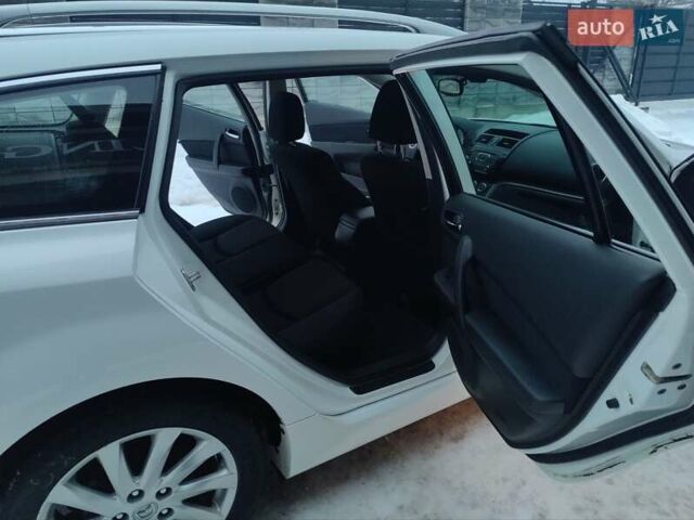 Белый Мазда 6, объемом двигателя 2 л и пробегом 210 тыс. км за 8500 $, фото 23 на Automoto.ua