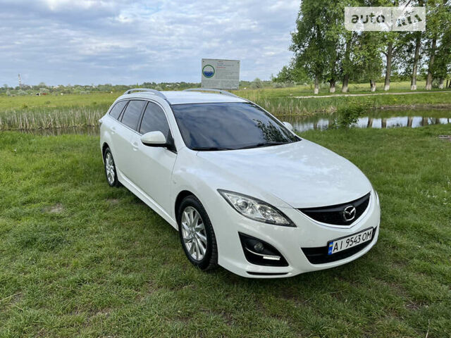 Білий Мазда 6, об'ємом двигуна 2 л та пробігом 225 тис. км за 10200 $, фото 9 на Automoto.ua