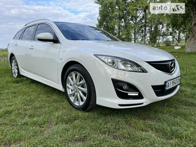 Білий Мазда 6, об'ємом двигуна 2 л та пробігом 225 тис. км за 10200 $, фото 33 на Automoto.ua