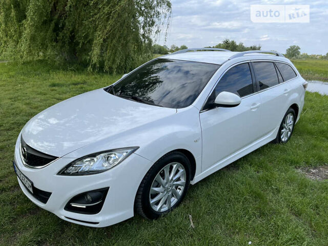 Білий Мазда 6, об'ємом двигуна 2 л та пробігом 225 тис. км за 10200 $, фото 34 на Automoto.ua