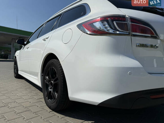 Білий Мазда 6, об'ємом двигуна 2.2 л та пробігом 231 тис. км за 7999 $, фото 7 на Automoto.ua
