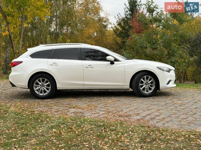 Белый Мазда 6, объемом двигателя 2.2 л и пробегом 250 тыс. км за 9199 $, фото 9 на Automoto.ua
