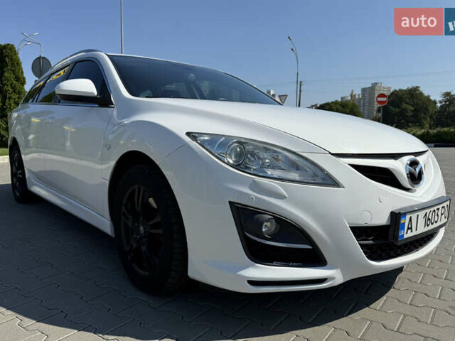 Білий Мазда 6, об'ємом двигуна 2.2 л та пробігом 231 тис. км за 7999 $, фото 9 на Automoto.ua