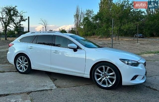 Белый Мазда 6, объемом двигателя 2.18 л и пробегом 130 тыс. км за 12600 $, фото 8 на Automoto.ua
