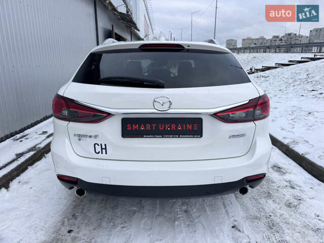 Білий Мазда 6, об'ємом двигуна 2.18 л та пробігом 199 тис. км за 11950 $, фото 47 на Automoto.ua