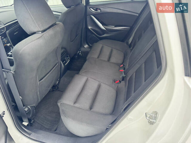 Білий Мазда 6, об'ємом двигуна 2.18 л та пробігом 199 тис. км за 11950 $, фото 23 на Automoto.ua