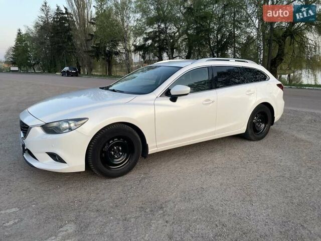 Білий Мазда 6, об'ємом двигуна 2.18 л та пробігом 263 тис. км за 9900 $, фото 18 на Automoto.ua