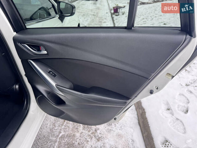 Білий Мазда 6, об'ємом двигуна 2.18 л та пробігом 199 тис. км за 11950 $, фото 28 на Automoto.ua