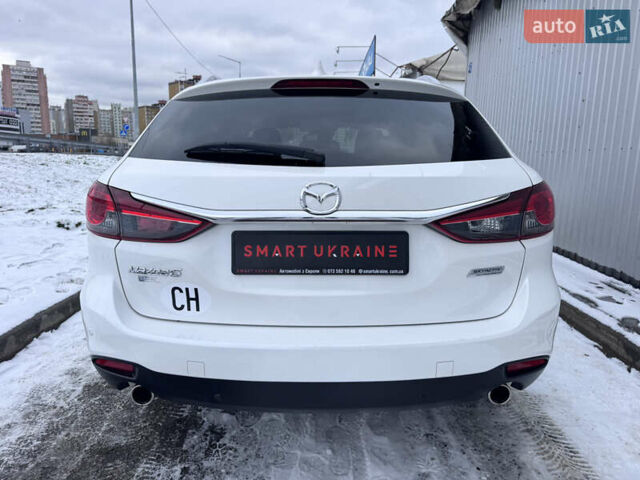 Білий Мазда 6, об'ємом двигуна 2.18 л та пробігом 199 тис. км за 11950 $, фото 9 на Automoto.ua