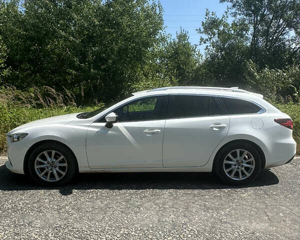 Білий Мазда 6, об'ємом двигуна 2.19 л та пробігом 235 тис. км за 11200 $, фото 7 на Automoto.ua