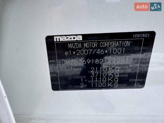Білий Мазда 6, об'ємом двигуна 2.18 л та пробігом 199 тис. км за 11950 $, фото 45 на Automoto.ua