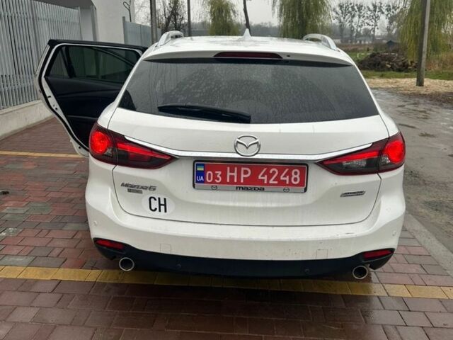 Белый Мазда 6, объемом двигателя 2.2 л и пробегом 200 тыс. км за 12000 $, фото 5 на Automoto.ua