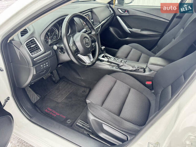 Білий Мазда 6, об'ємом двигуна 2.18 л та пробігом 199 тис. км за 11950 $, фото 16 на Automoto.ua