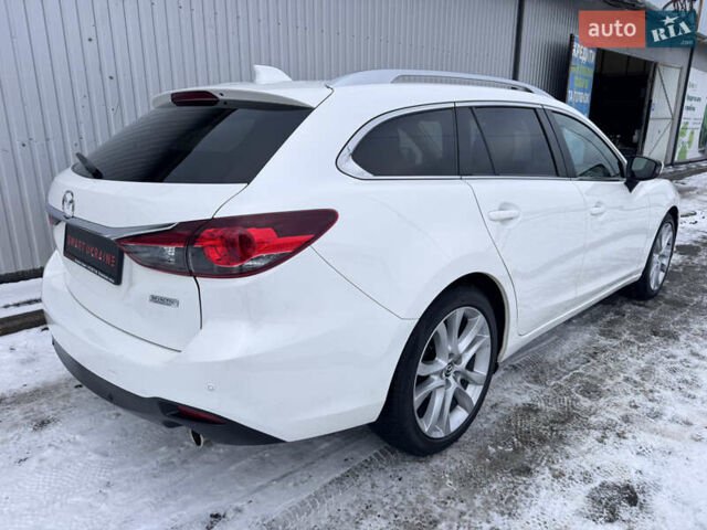 Білий Мазда 6, об'ємом двигуна 2.18 л та пробігом 199 тис. км за 11950 $, фото 2 на Automoto.ua