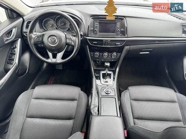 Білий Мазда 6, об'ємом двигуна 2.18 л та пробігом 199 тис. км за 11950 $, фото 14 на Automoto.ua