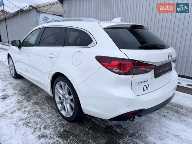 Білий Мазда 6, об'ємом двигуна 2.18 л та пробігом 199 тис. км за 11950 $, фото 7 на Automoto.ua