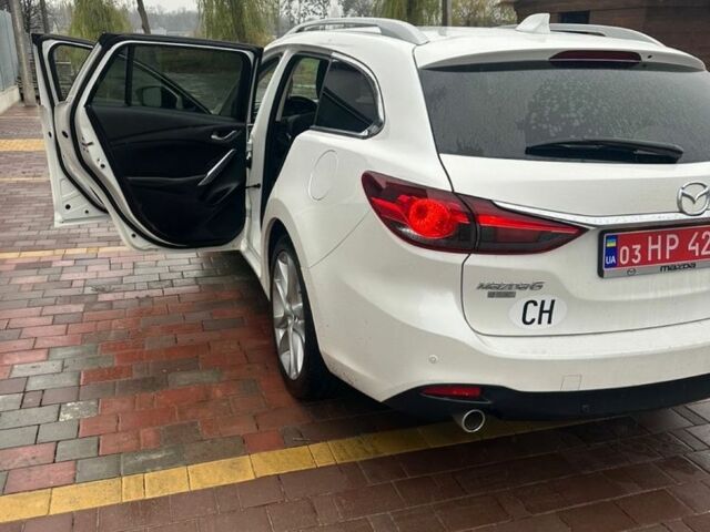Білий Мазда 6, об'ємом двигуна 2.2 л та пробігом 200 тис. км за 12000 $, фото 7 на Automoto.ua