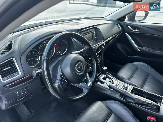Белый Мазда 6, объемом двигателя 2.18 л и пробегом 179 тыс. км за 10700 $, фото 13 на Automoto.ua