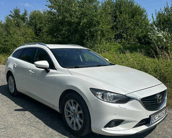 Білий Мазда 6, об'ємом двигуна 2.19 л та пробігом 235 тис. км за 11200 $, фото 3 на Automoto.ua