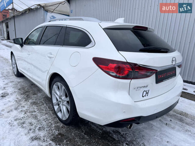 Білий Мазда 6, об'ємом двигуна 2.18 л та пробігом 199 тис. км за 11950 $, фото 44 на Automoto.ua