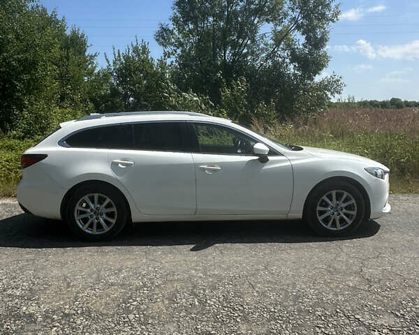 Білий Мазда 6, об'ємом двигуна 2.19 л та пробігом 235 тис. км за 11200 $, фото 6 на Automoto.ua