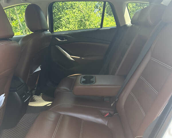 Білий Мазда 6, об'ємом двигуна 2.19 л та пробігом 235 тис. км за 11200 $, фото 15 на Automoto.ua