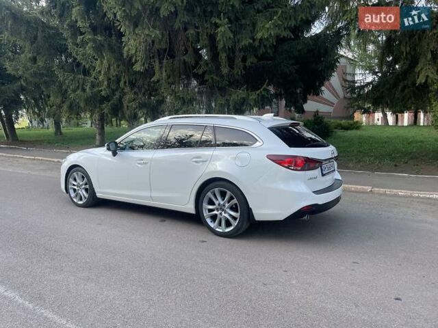 Білий Мазда 6, об'ємом двигуна 2.18 л та пробігом 263 тис. км за 9900 $, фото 6 на Automoto.ua