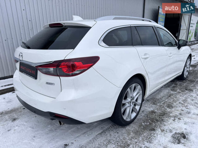 Білий Мазда 6, об'ємом двигуна 2.18 л та пробігом 199 тис. км за 11950 $, фото 49 на Automoto.ua