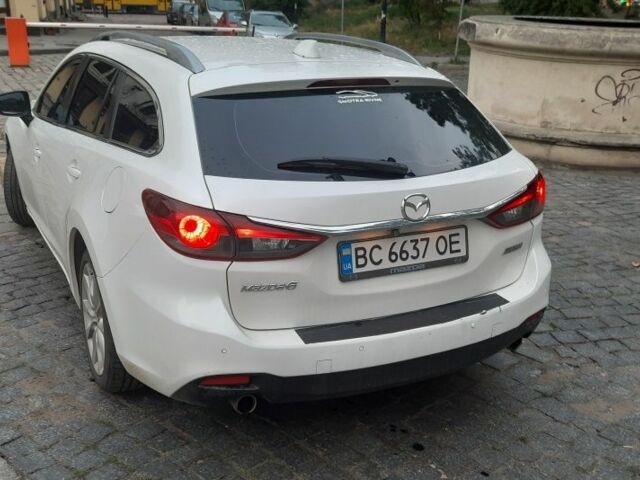 Білий Мазда 6, об'ємом двигуна 2 л та пробігом 268 тис. км за 9471 $, фото 3 на Automoto.ua