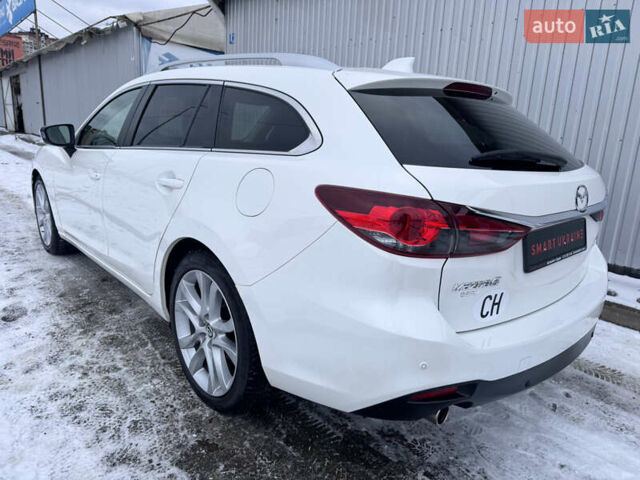 Білий Мазда 6, об'ємом двигуна 2.18 л та пробігом 199 тис. км за 11950 $, фото 42 на Automoto.ua