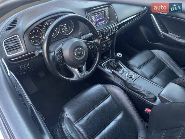 Білий Мазда 6, об'ємом двигуна 2.18 л та пробігом 263 тис. км за 9900 $, фото 19 на Automoto.ua