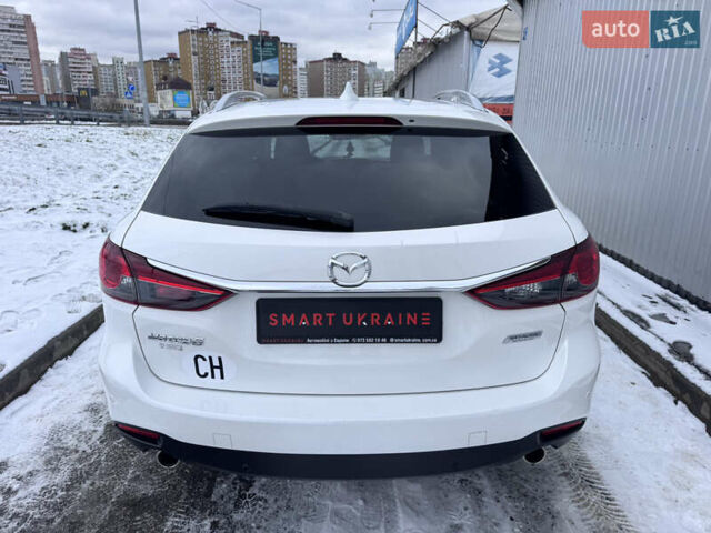 Білий Мазда 6, об'ємом двигуна 2.18 л та пробігом 199 тис. км за 11950 $, фото 11 на Automoto.ua