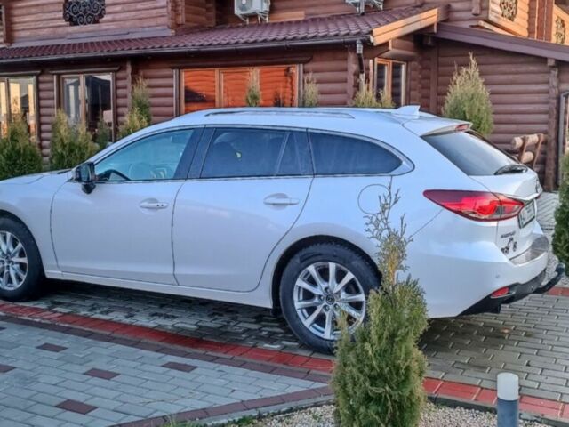 Білий Мазда 6, об'ємом двигуна 2.19 л та пробігом 287 тис. км за 14200 $, фото 4 на Automoto.ua