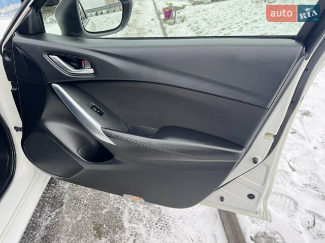 Білий Мазда 6, об'ємом двигуна 2.18 л та пробігом 199 тис. км за 11950 $, фото 34 на Automoto.ua