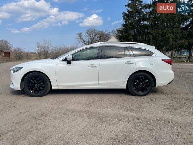 Білий Мазда 6, об'ємом двигуна 2.18 л та пробігом 216 тис. км за 10800 $, фото 6 на Automoto.ua