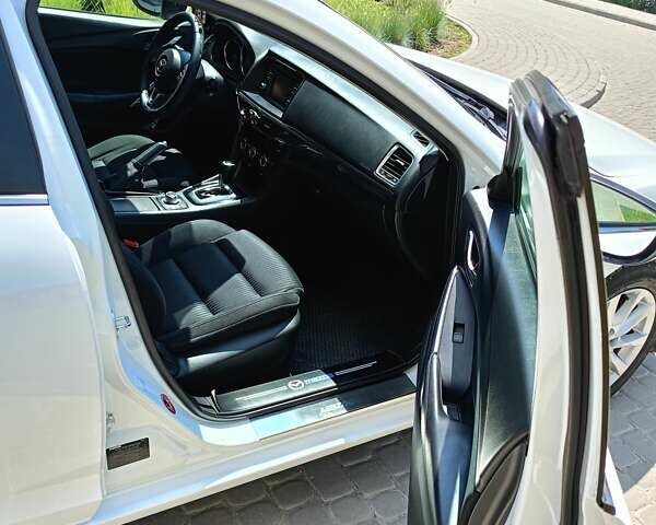 Білий Мазда 6, об'ємом двигуна 2.2 л та пробігом 215 тис. км за 11200 $, фото 16 на Automoto.ua