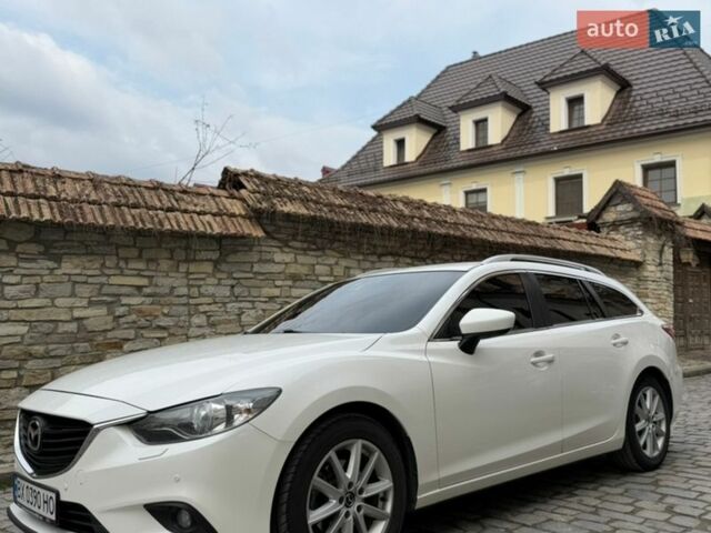 Білий Мазда 6, об'ємом двигуна 2.19 л та пробігом 239 тис. км за 10999 $, фото 4 на Automoto.ua