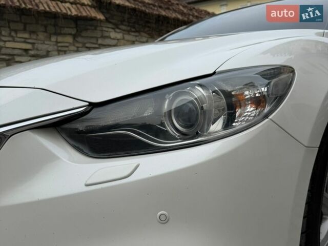 Білий Мазда 6, об'ємом двигуна 2.19 л та пробігом 239 тис. км за 10999 $, фото 22 на Automoto.ua