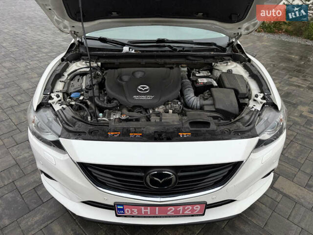 Білий Мазда 6, об'ємом двигуна 2.2 л та пробігом 181 тис. км за 11000 $, фото 66 на Automoto.ua