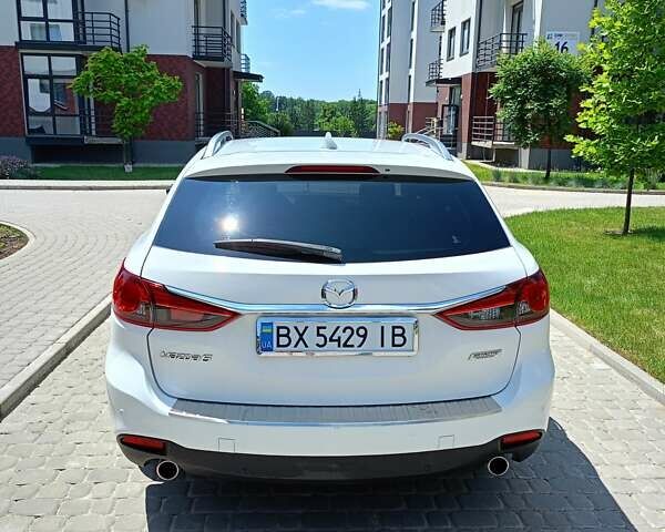 Білий Мазда 6, об'ємом двигуна 2.2 л та пробігом 215 тис. км за 11200 $, фото 4 на Automoto.ua