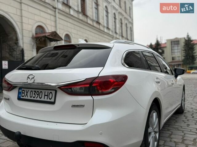 Білий Мазда 6, об'ємом двигуна 2.19 л та пробігом 239 тис. км за 10999 $, фото 10 на Automoto.ua