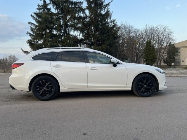 Білий Мазда 6, об'ємом двигуна 2.2 л та пробігом 216 тис. км за 10800 $, фото 9 на Automoto.ua