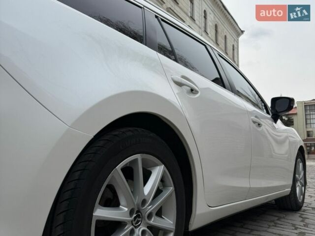 Білий Мазда 6, об'ємом двигуна 2.19 л та пробігом 239 тис. км за 10999 $, фото 18 на Automoto.ua