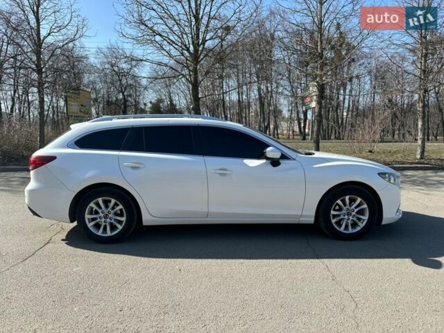 Белый Мазда 6, объемом двигателя 2.2 л и пробегом 238 тыс. км за 9300 $, фото 18 на Automoto.ua