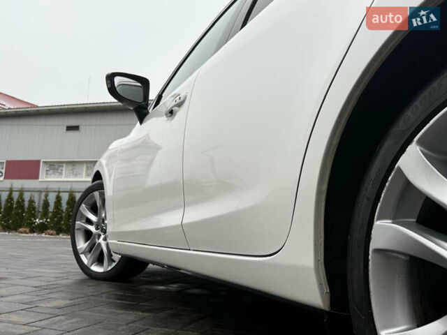 Білий Мазда 6, об'ємом двигуна 2.2 л та пробігом 181 тис. км за 11000 $, фото 19 на Automoto.ua